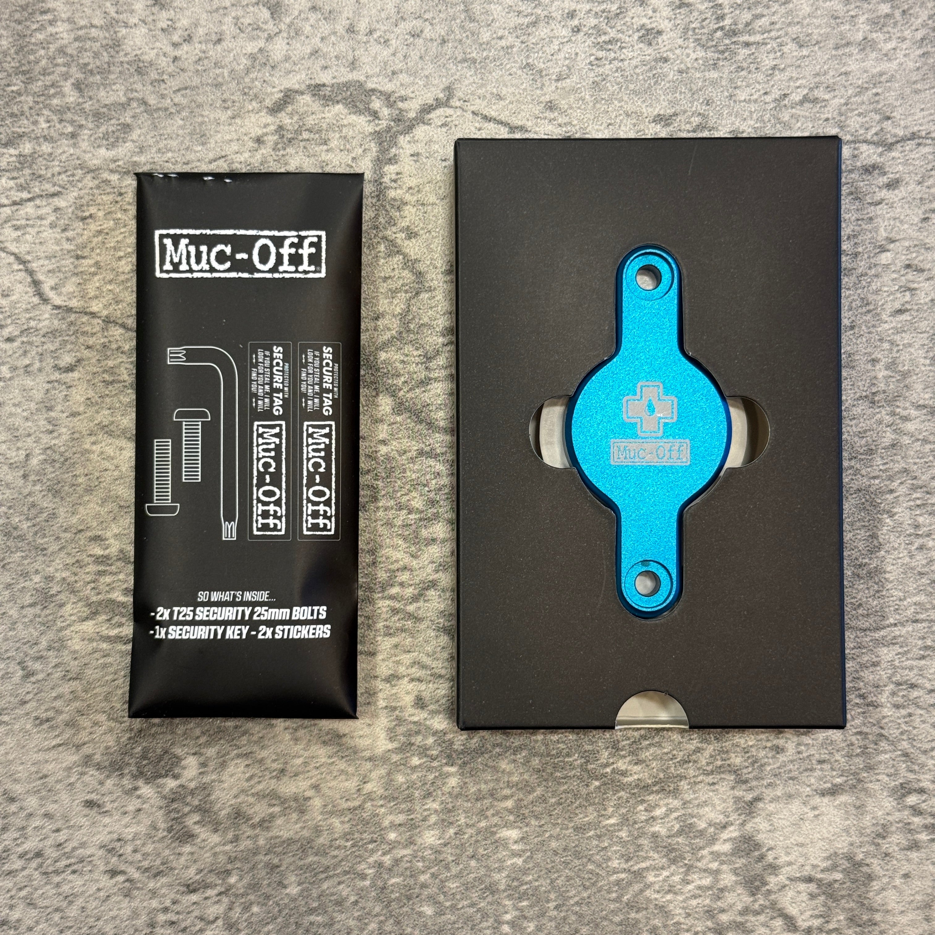 Muc-0ff/ SECURE TAG HOLDER